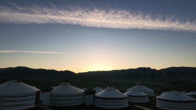 Cinematic Sunrise over Traditional Mongolian Gers in the Steppe