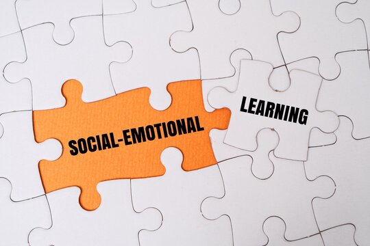 "SOCIAL-EMOTIONAL LEARNING" word alphabet letters on puzzle. The integration of emotional intelligence in education and growth concepts
