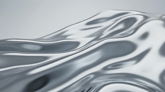 Liquid metal silver waves video. Abstract 3D chrome surface ripples in a smooth seamless loop. Rhythmic undulating metallic flow for futuristic technology backgrounds and modern corporate video.