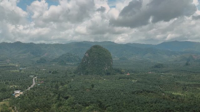 Panoramic vista of Tianmen Mountain, Chumphon, Thailand, showcasing tropical forests and distant hills.