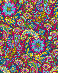 Seamless repeating pattern with paisley motifs placed at different angles, balanced by smaller floral elements and filler © Venkatsai