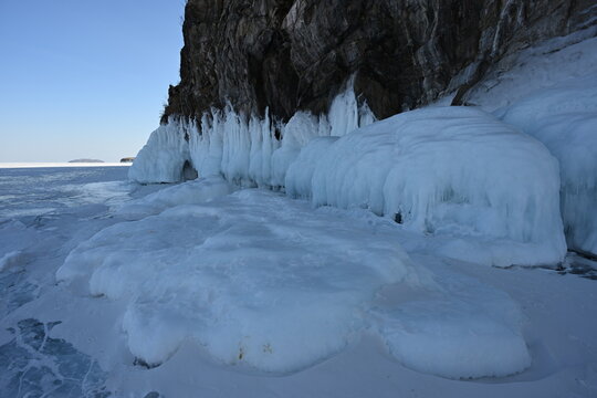 The icy rocks of Cape Dragon on Ogoy Island in Lake Baikal. Russia