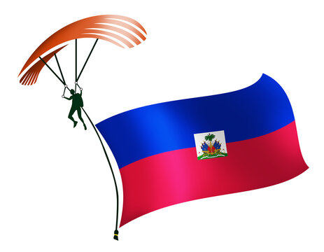 A skydiver, A paratrooper, A parachutist carrying a flag of Haiti