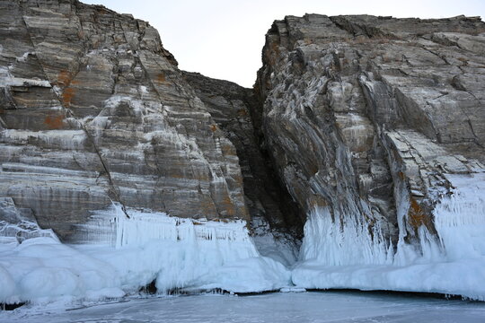 The icy rocks of Cape Dragon on Ogoy Island in Lake Baikal. Russia