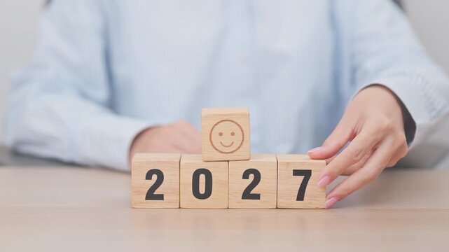 Happy New Year 2027 with Smile block. Satisfaction, feedback, Review, mental health, eco sustainable and good year concept