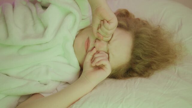 Kid sleep dreaming quietly. Child sleeping cozy environment. Kid sleep calm bedtime. Child sleeping in a cozy bed. Kid sleep peaceful rest. Kid sleep at home. Child sleeping cute in deep rest.