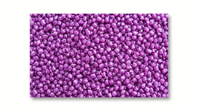 Plastic pellets in vibrant purple fill the frame completely as a manufacturing raw material background.
