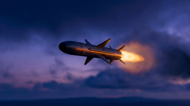 Military missile flying fast in the cloudy sky during sunset