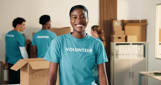 Woman, volunteer and face in NGO with smile, community service or outreach program for relief. Coordinator, representative or happy at event for food drive, social responsibility or donations for aid