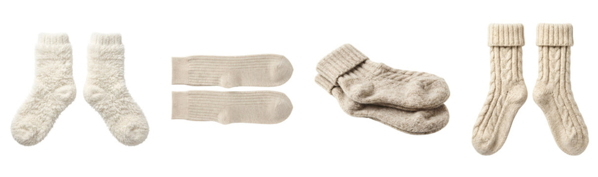 Collection of various beige and white woolen knitted winter socks arranged horizontally in different styles isolated on transparent background