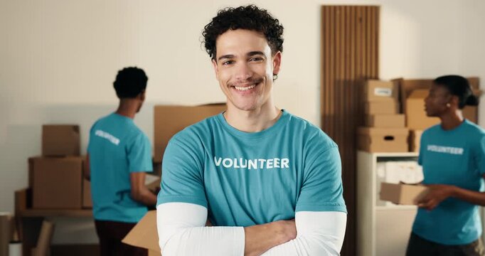 Man, volunteer and face in NGO with arms crossed, charity preparation and outreach program. Coordinator, confident and happy at centre for food drive, social responsibility or donations for project