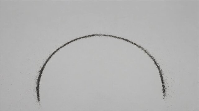Minimal top view curved dark line forming arch and abstract arc shape over soft gray texture background, delicate circular pattern, grainy dust, spacious negative space, subtle atmospheric contrast