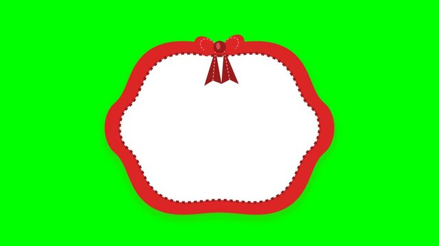 Decorative red frame with a bow on a green background for holiday designs.