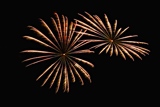 Fireworks lighting up the night sky. Pyrotechnics, abstract