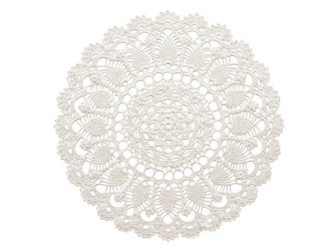 Intricate white crochet doily with geometric lace pattern displayed on neutral background.