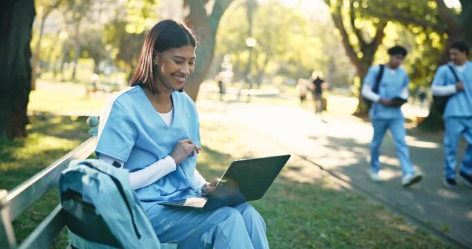 Woman, laptop and med student in park with connectivity, schedule or smile for submit assignment. Education, healthcare or trainee nurse with tech for research, typing or apply to internship on bench
