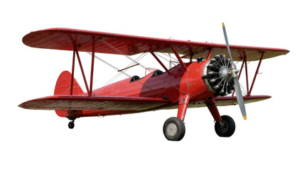 Vintage red biplane with radial engine and propeller, isolated on transparent background © Niamh