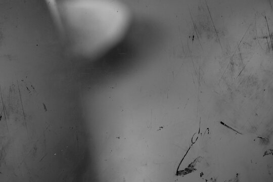 grunge rough scratch and dust on black background, retro film overlay effect with scratch dust, retro grain noisy film distressed light leak flare on black background
