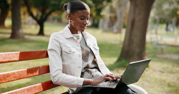 Elearning, smile and college student in park with laptop, exam knowledge and review of digital task. Education, typing and black woman outdoor with tech, university thesis and research for assessment