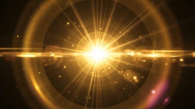 Brilliant golden sun flare effect with beautiful circular lens artifacts and light streaks on black background