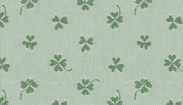 Lace fabric with green clover pattern