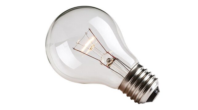Clear glass incandescent light bulb with glowing tungsten filament