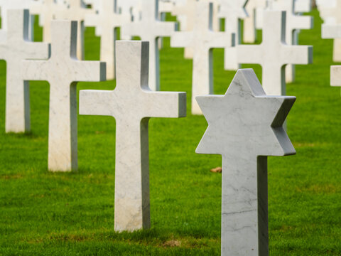 St. Mihiel American Cemetery in Thiaucourt France. White crosses and gravestone with a star of David