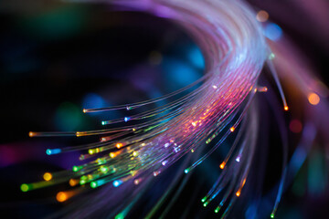 Fototapeta premium Abstract digital art featuring flowing, colorful light trails against a dark background.