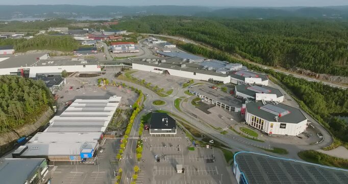 Aerial view of S&oslash;rlandsparken commercial district in Kristiansand Norway in slow motion showing shopping mall exterior