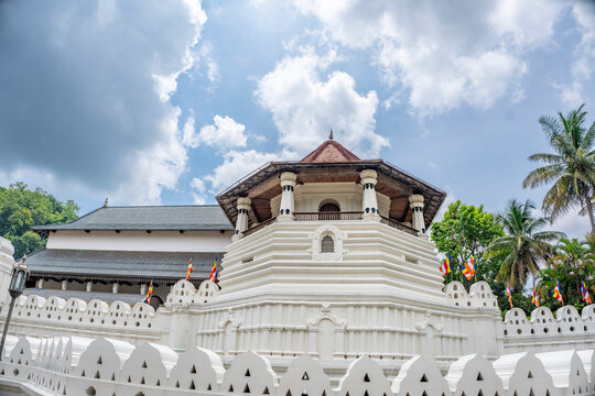 Low angle view of Paththirippuwa octagonal tower at Temple of the Tooth in Kandy, Sri Lanka. The Temple of the Sacred Tooth Relic, known locally as Sri Dalada Maligawa, is a famous Buddhist temple