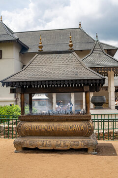 Traditional bronze incense burner with Sri Dalada Maligawa inscription at Temple of the Tooth, Kandy, Sri Lanka. The Temple of the Sacred Tooth Relic, known locally as Sri Dalada Maligawa