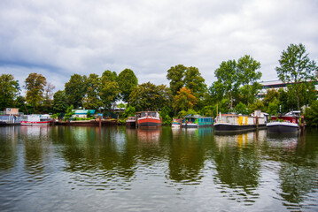 Fototapeta premium House boats moored on a side arm of the Havel river