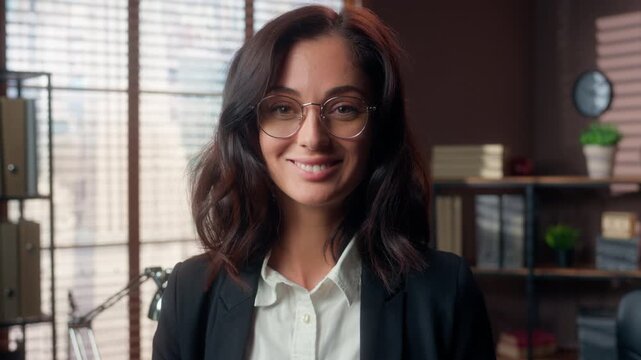 Happy Caucasian business woman in glasses smiling looking at camera in office portrait female businesswoman manager employee leader headshot positive expression professional face entrepreneur indoor