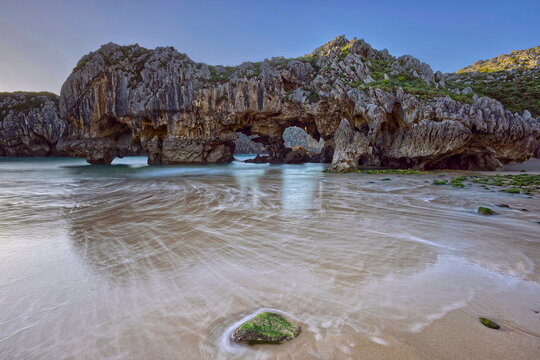 Playa Cuevas del Mar Beach, scenic karst area stated a Natural Monument due to the geological value of its rock formations. Llanes-Asturias-Spain-077