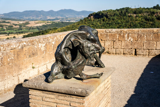 Surrealist bronze sculpture by contemporary American artist Jack Zajac inside the Albornoz Fortress, a medieval papal stronghold overlooking the city, Orvieto, Umbria, Italy