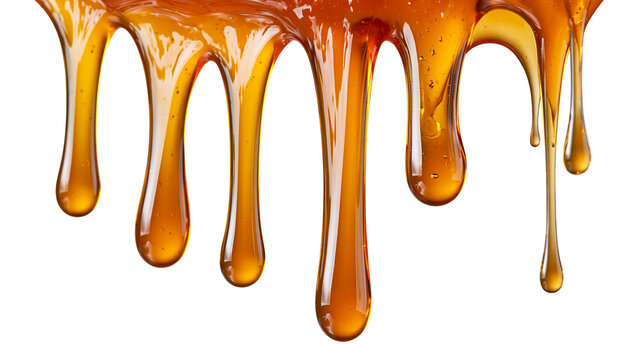 Thick golden honey dripping and flowing down in smooth viscous streams