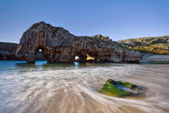Playa Cuevas del Mar Beach, scenic karst area stated a Natural Monument due to the geological value of its rock formations. Llanes-Asturias-Spain-074