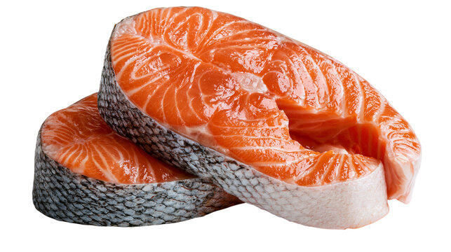 Fresh raw salmon fish steaks with orange flesh and silver skin