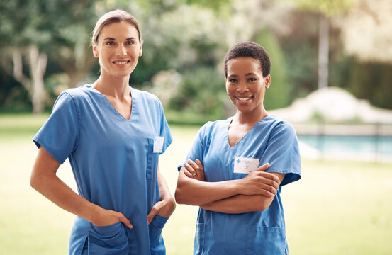 Outdoor, nurse team and retirement home with portrait for medical service, help and career. Happy, women and nursing job for senior care, assisted living and crossed arms at healthcare facility
