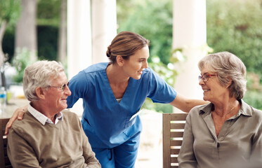 Nurse, support and senior couple at garden for care, medical assistance and happiness on break....