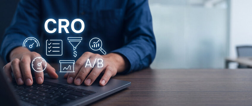 Conversion Rate Optimization CRO Concept, Businessman Working on Laptop with Digital Marketing Interface for Business Growth, A/B Testing, and Customer Journey Analysis on Website.