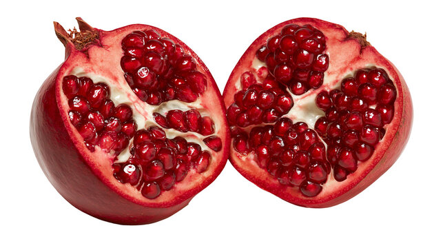 Two halves of a fresh ripe pomegranate showing juicy red seeds and white pith