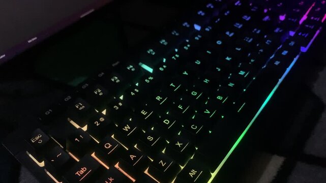 Colorful RGB Gaming Keyboard Glowing in Dark&mdash;Ideal for Technology and Gaming Concept