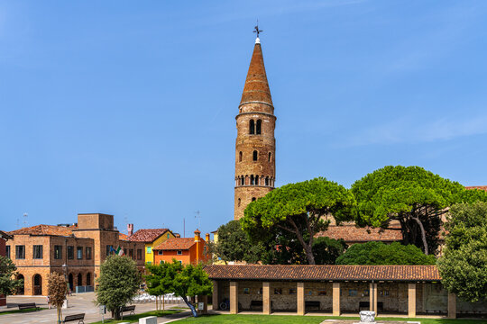 View of Cathedral of Santo Stefano and the bell tower in Caorle on the Adriatic Sea coast in summer, Metropolitan of Venice, Veneto, Italy
