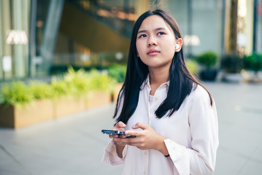 woman talking and command an AI voice assistant on a smartphone as a conceptual backdrop for artificial intelligence technology communication phone innovation virtual assistant and smart lifestyle