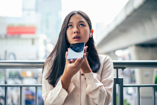woman talking and command an AI voice assistant on a smartphone as a conceptual backdrop for artificial intelligence technology communication phone innovation virtual assistant and smart lifestyle