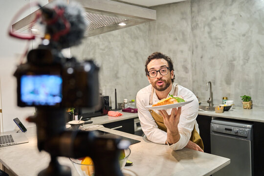 Chef creating cooking video content for social media