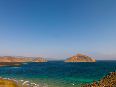 Volcanic islets rise from the turquoise waters of the Devil's Cauldron, Tadjourah Region, Goubet Al-kharab, Djibouti