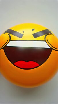 Emoji face flipping close-up between frustration and laughter, supporting reaction stickers, social media humor, chat messaging, mood change graphics, online comments, and entertainment app media.