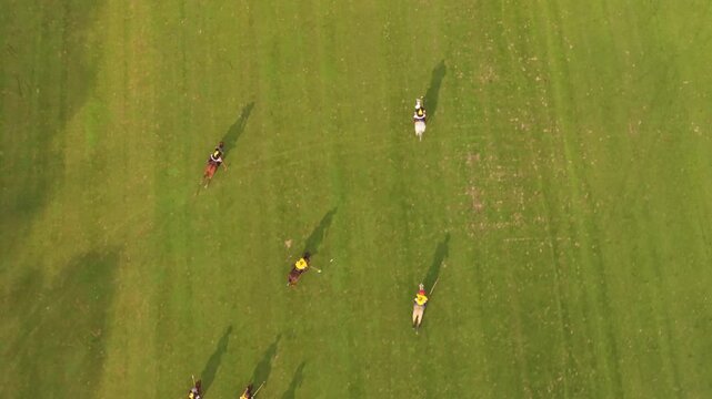 Aerial view of equestrian players competing in a polo match